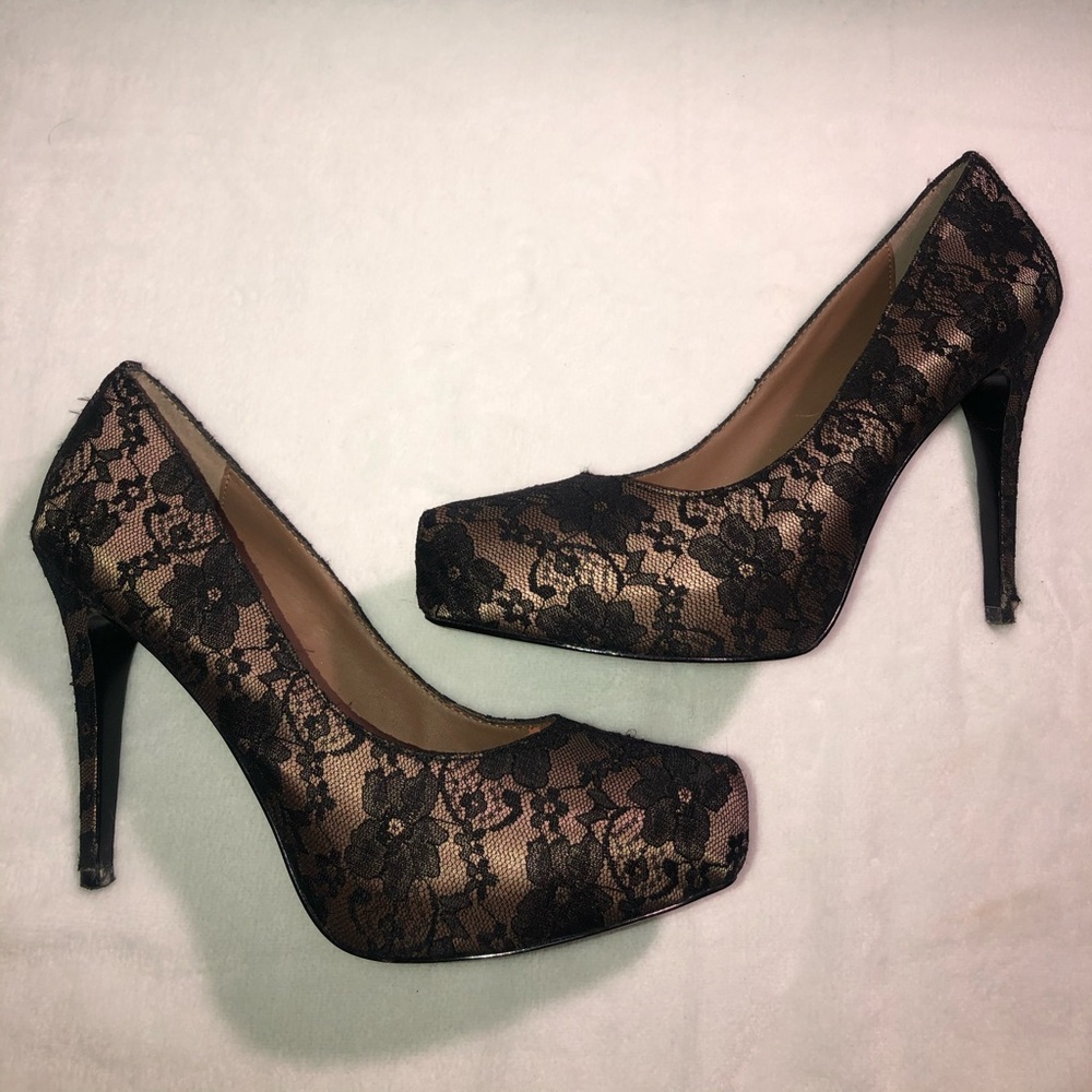 Cream heels with black floral lace.